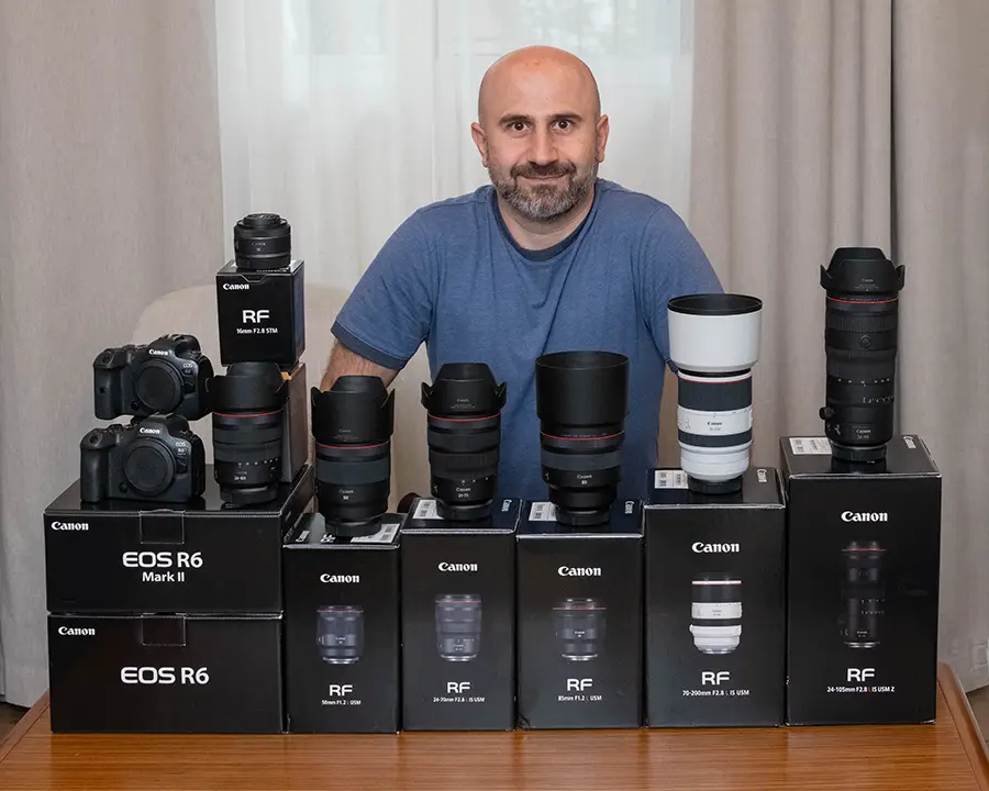 The Photographer With His Lenses