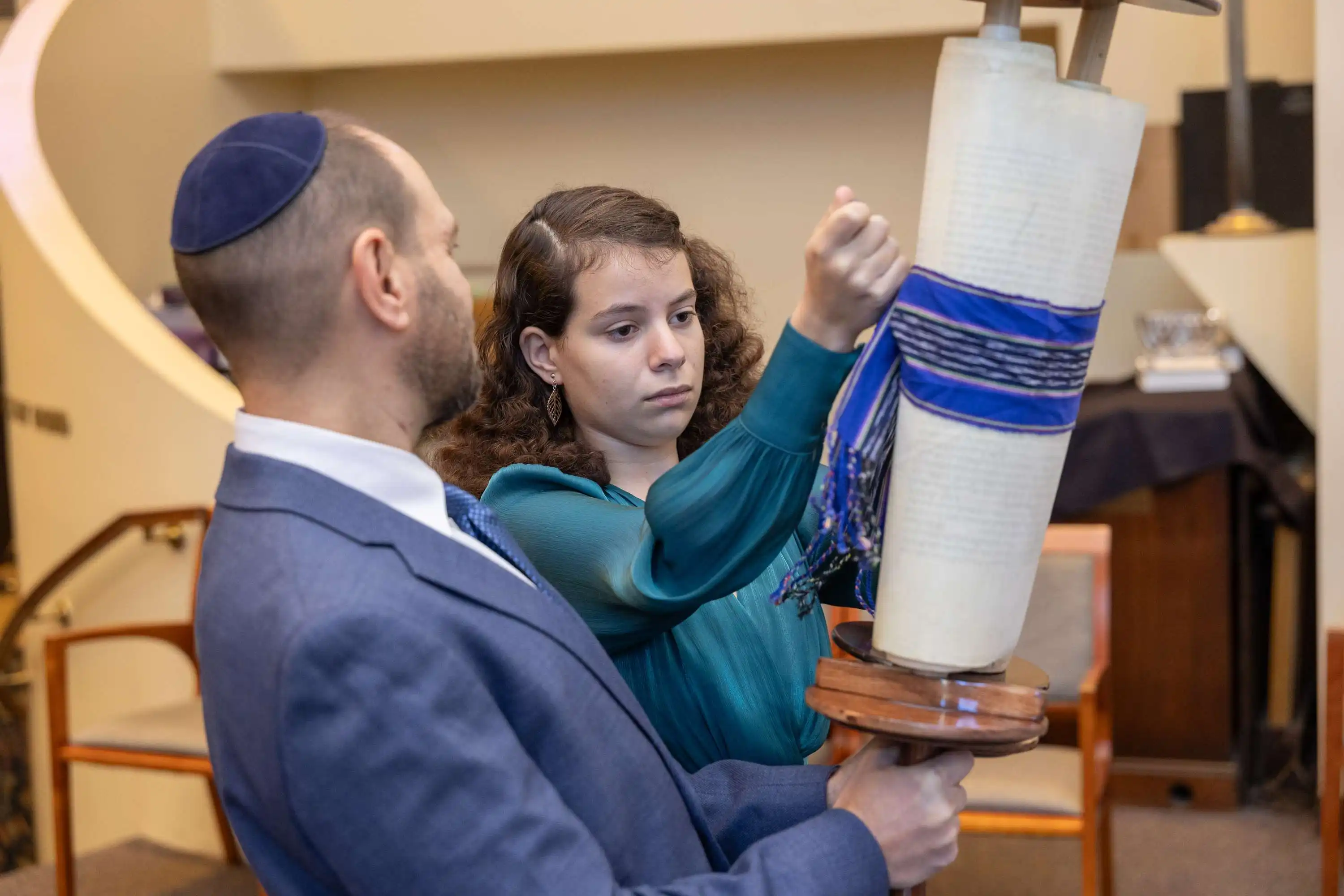 Dad Helping During Mitzvah Ceremony